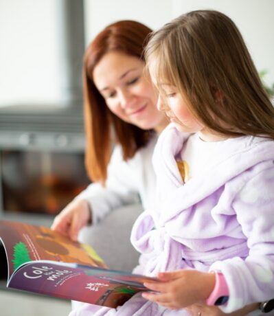 Cole the mole - Girl reading Cole the mole - heart-warming children's story set in the African wilderness