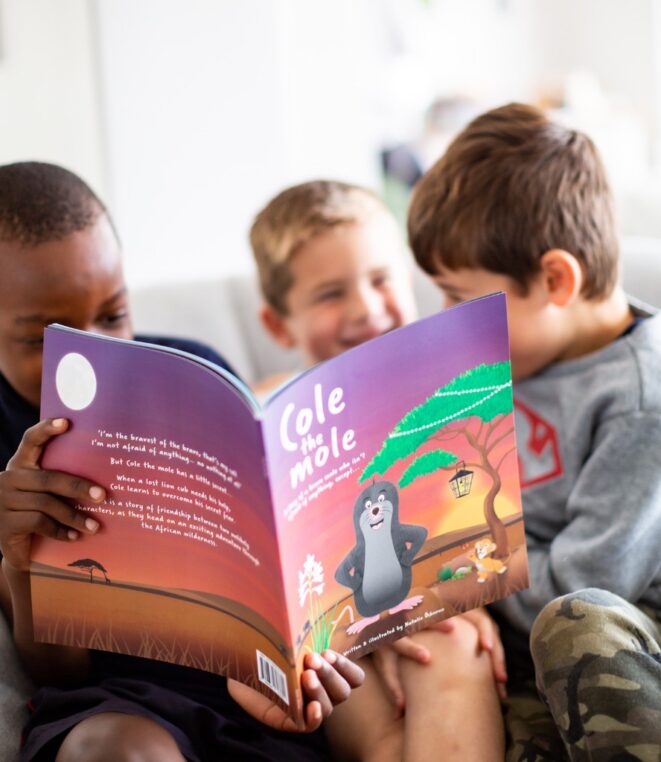 Cole the mole - Boys reading Cole the mole - heart-warming children's story set in the African wilderness